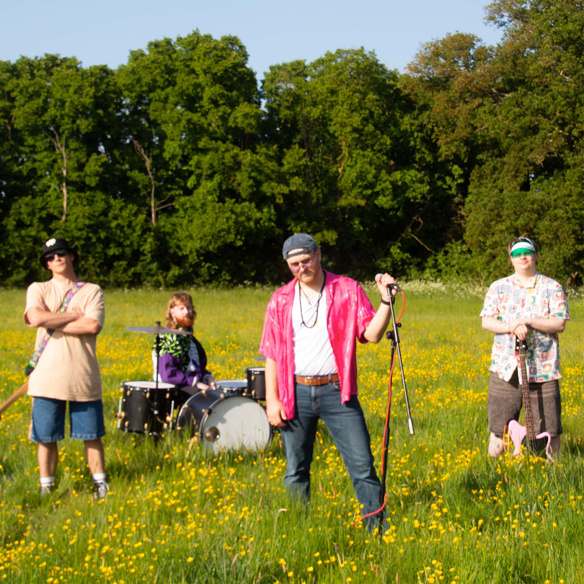 BANGKITAN playing in a field of buttercups