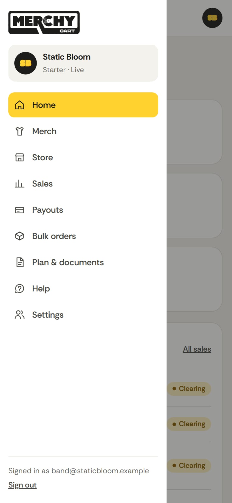 The studio's menu open on a phone: Home, Merch, Store, Sales, Payouts, Bulk orders, Plan & documents, Help and Settings